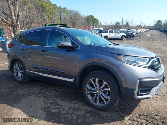 2021 Honda CR-V Touring with VIN 2HKRW2H9XMH645901, listed as a IAAI auction lot 41870446 with 22,996 mi miles. Bid and sale history available at carsss.com. Image 1.