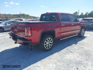 2018 GMC Sierra 1500 Denali with VIN 3GTU2PEJ9JG172983, listed as a IAAI auction lot 41784319 with 74,025 mi miles. Bid and sale history available at carsss.com. Image 4.