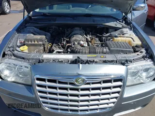 2006 Chrysler 300 C with VIN 2C3KA63H56H313967, listed as a IAAI auction lot 42056998 with 143,592 mi miles and . Bid and sale history available at carsss.com. Image 10.