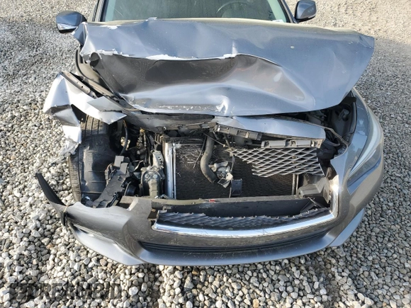 2015 Infiniti Q50 Premium with VIN JN1BV7AP3FM340598, listed as a Copart auction lot 50459855 with 104,938 mi miles and Salvage Title. Bid and sale history available at carsss.com. Image 11.