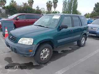 1999 Honda CR-V LX with VIN JHLRD284XXC002638, listed as a IAAI auction lot 42110994 with 164,706 mi miles. Bid and sale history available at carsss.com. Image 2.