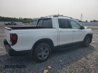 2022 Honda Ridgeline RTL-E with VIN 5FPYK3F70NB006495, listed as a Copart auction lot 57756735 with 43,874 mi miles and Salvage title. Bid and sale history available at DreamBid. Image 3.