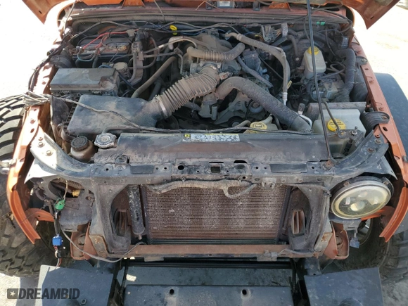 2011 Jeep Wrangler Unlimited Sahara with VIN 1J4BA5H19BL588797, listed as a Copart auction lot 72681904 with 100,763 mi miles and Salvage Title. Bid and sale history available at carsss.com. Image 12.