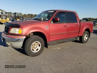 2001 Ford F-150 XLT with VIN 1FTRW08W61KF97692, listed as a Copart auction lot 50735415 with 300,525 mi miles and Salvage title. Bid and sale history available at DreamBid. Image 1.