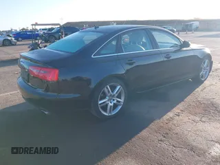 2014 Audi A6 Premium Plus with VIN WAUGFAFC7EN014764, listed as a IAAI auction lot 42261384 with 117,285 mi miles and . Bid and sale history available at DreamBid. Image 4.