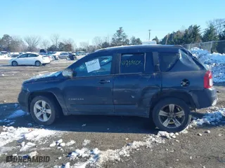 2015 Jeep Compass Latitude with VIN 1C4NJDEB6FD217056, listed as a IAAI auction lot 41269105 with 152,403 mi miles. Bid and sale history available at carsss.com. Image 14.