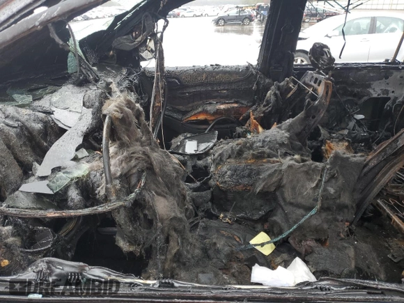 2018 Chevrolet Suburban LT z VIN 1GNSKHKC9JR262273, wystawiony jako Copart lot #51970175 z przebiegiem Nie podano mil oraz Szkoda całkowita • Salvage title. Historia ofert i sprzedaży dostępna na DreamBid. Obrazek 7.