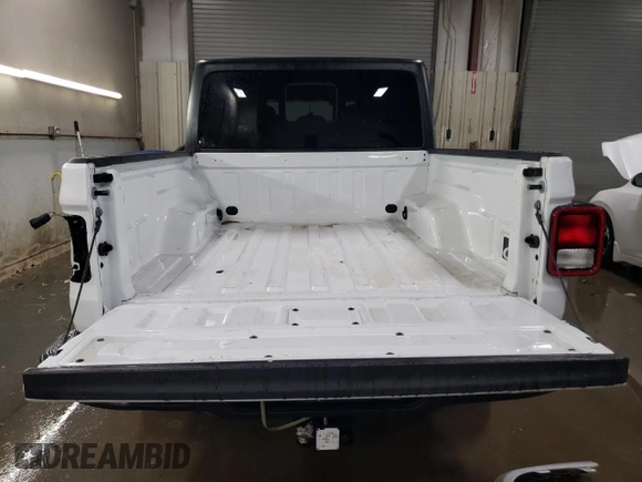 2023 Jeep Gladiator Sport с VIN 1C6HJTAG3PL571060, выставлен на аукционе Copart как лот 46112255 с пробегом 23 352 миль миль и Списание • Salvage title. История ставок и продаж доступна на DreamBid. Изображение 6.