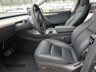 2023 Tesla Model Y Long Range z VIN 7SAYGDEE5PA164270, wystawiony jako Copart lot #50260835 z przebiegiem 17 340 mil mil oraz Szkoda całkowita • Salvage title. Historia ofert i sprzedaży dostępna na DreamBid. Obrazek 7.