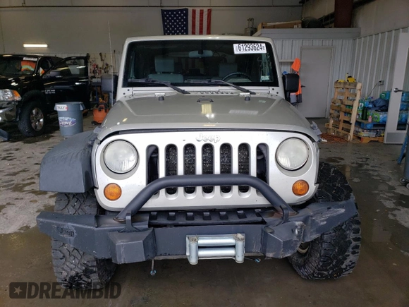 2007 Jeep Wrangler Rubicon z VIN 1J8GA64117L187431, wystawiony jako Copart lot #61293624 z przebiegiem 263 459 mil mil oraz Szkoda całkowita • Salvage title. Historia ofert i sprzedaży dostępna na DreamBid. Obrazek 5.