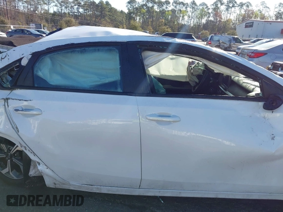 2021 Kia Forte LXS z VIN 3KPF24AD3ME382227, wystawiony jako IAAI lot #41792663 z przebiegiem 50 251 mil mil oraz . Historia ofert i sprzedaży dostępna na DreamBid. Obrazek 13.