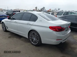 2018 BMW 5 Series 530e with VIN WBAJA9C5XJB033667, listed as a IAAI auction lot 42107936 with 55,753 mi miles and . Bid and sale history available at DreamBid. Image 3.