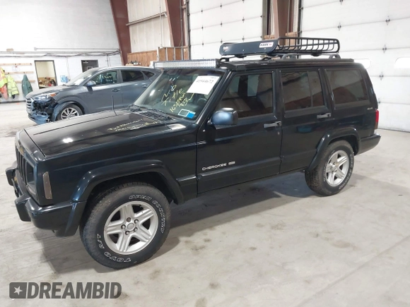 2001 Jeep Cherokee Sport z VIN 1J4FF58S11L562933, wystawiony jako IAAI lot #41944672 z przebiegiem 163 078 mil mil oraz . Historia ofert i sprzedaży dostępna na DreamBid. Obrazek 2.