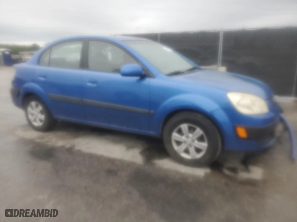 2009 Kia Rio SX with VIN KNADE223896572348, listed as a Copart auction lot 51949235 with 161,546 mi miles and Salvage Title. Bid and sale history available at carsss.com. Image 4.
