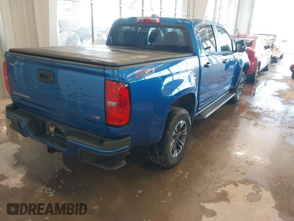 2021 Chevrolet Colorado 4WD Z71 with VIN 1GCGTDEN7M1141049, listed as a IAAI auction lot 41223962 with 62,114 mi miles and . Bid and sale history available at DreamBid. Image 4.