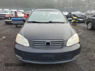 2005 Toyota Corolla CE with VIN 1NXBR30E75Z463700, listed as a Copart auction lot 84317814 with 210,910 mi miles and Clean Title. Bid and sale history available at DreamBid. Image 5.
