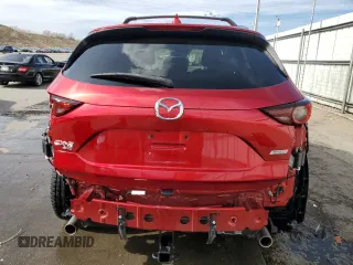 2017 Mazda CX-5 Touring with VIN JM3KFBCL2H0130289, listed as a Copart auction lot 51287885 with 70,170 mi miles and Salvage Title. Bid and sale history available at carsss.com. Image 6.