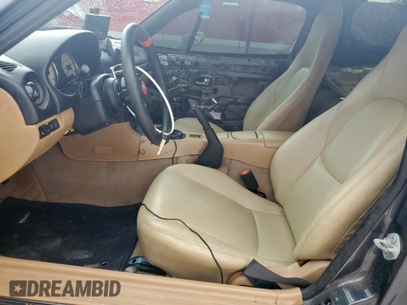 2001 Mazda MX-5 Miata with VIN JM1NB353210210976, listed as a Copart auction lot 59653695 with 152,250 mi miles and Salvage title. Bid and sale history available at DreamBid. Image 7.