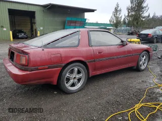 1987 Toyota Supra z VIN JT2MA70J6H0060238, wystawiony jako Copart lot #84754334 z przebiegiem 201 761 mil mil oraz Czysty tytuł • Clean title. Historia ofert i sprzedaży dostępna na DreamBid. Obrazek 3.