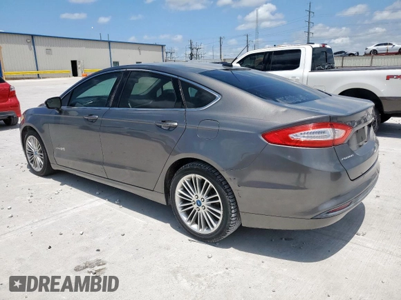 2013 Ford Fusion SE Hybrid with VIN 3FA6P0LU8DR261232, listed as a Copart auction lot 60674105 with 132,901 mi miles and Clean title. Bid and sale history available at DreamBid. Image 2.