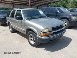 1999 Chevrolet Blazer LS with VIN 1GNCS13WXX2174984, listed as a IAAI auction lot 42575933 with 266,426 mi miles and . Bid and sale history available at DreamBid. Image 1.