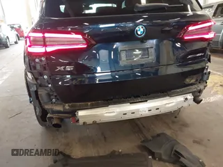 2022 BMW X5 xDrive45e with VIN 5UXTA6C05N9L41274, listed as a IAAI auction lot 42247190 with 18,701 mi miles and . Bid and sale history available at DreamBid. Image 20.