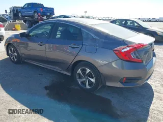 2019 Honda Civic Sedan LX with VIN 19XFC2F64KE005270, listed as a IAAI auction lot 41852238 with 106,604 mi miles. Bid and sale history available at carsss.com. Image 3.