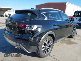 2018 Infiniti QX30 Luxury with VIN SJKCH5CRXJA058994, listed as a IAAI auction lot 41389481 with 69,907 mi miles and . Bid and sale history available at DreamBid. Image 4.