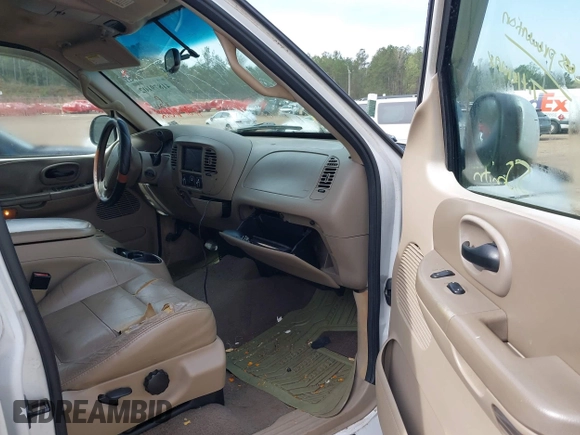 2001 Ford F-150 XLT with VIN 1FTRW07641KC51870, listed as a IAAI auction lot 41879102 with 202,967 mi miles and . Bid and sale history available at DreamBid. Image 5.