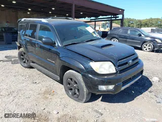 2004 Toyota 4Runner SR5 with VIN JTEBU14R940021054, listed as a IAAI auction lot 40557923 with 164,383 mi miles. Bid and sale history available at carsss.com. Image 1.
