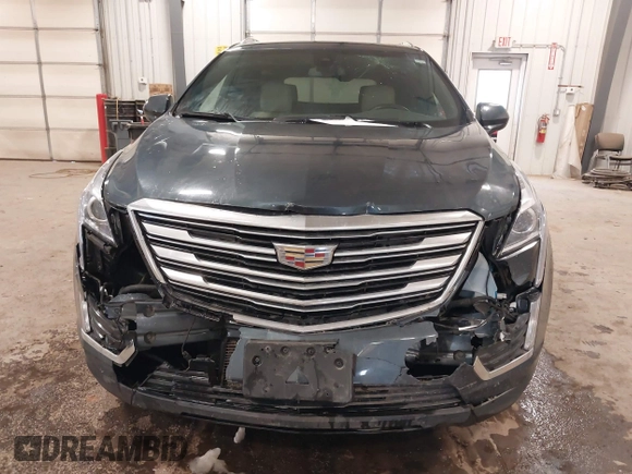 2019 Cadillac XT5 Luxury AWD z VIN 1GYKNDRS0KZ213092, wystawiony jako IAAI lot #41510497 z przebiegiem 26 030 mil mil oraz . Historia ofert i sprzedaży dostępna na DreamBid. Obrazek 6.
