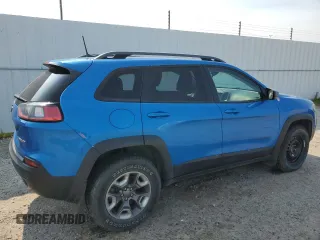 2019 Jeep Cherokee Trailhawk with VIN 1C4PJMBX7KD277477, listed as a Copart auction lot 58969705 with 139,521 mi miles and Salvage title. Bid and sale history available at DreamBid. Image 3.