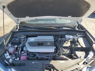 2024 Lexus UX with VIN JTHX6JBH0R2188086, listed as a Copart auction lot 79203964 with 7,703 mi miles and Salvage Title. Bid and sale history available at carsss.com. Image 12.
