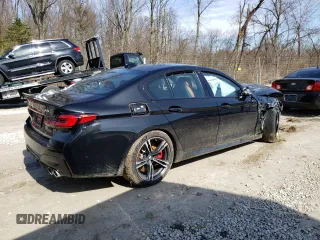 2022 BMW M5 z VIN WBS83CH01NCH75182, wystawiony jako Copart lot #46284903 z przebiegiem Nie podano mil oraz . Historia ofert i sprzedaży dostępna na DreamBid. Obrazek 3.