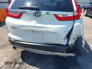 2018 Honda CR-V Touring with VIN 2HKRW2H93JH686298, listed as a IAAI auction lot 41979786 with 100,087 mi miles. Bid and sale history available at carsss.com. Image 6.