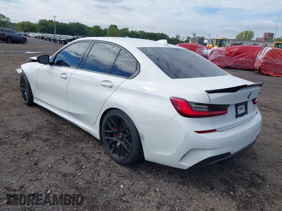 2021 BMW 3 Series M340i xDrive with VIN 3MW5U9J01M8B89618, listed as a IAAI auction lot 40473458 with 58,438 mi miles. Bid and sale history available at carsss.com. Image 3.