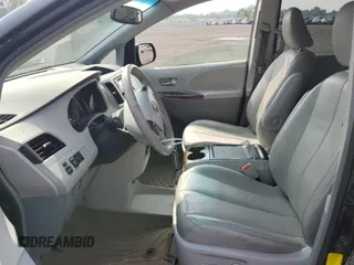 2013 Toyota Sienna XLE AAS with VIN 5TDYK3DCXDS333750, listed as a Copart auction lot 60894295 with 154,400 mi miles and Salvage title. Bid and sale history available at DreamBid. Image 7.