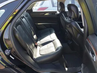 2014 Lincoln MKZ with VIN 3LN6L2G92ER826644, listed as a IAAI auction lot 42797602 with 153,069 mi miles and . Bid and sale history available at DreamBid. Image 8.