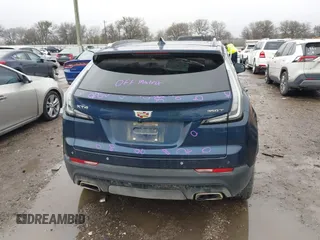 2022 Cadillac XT4 FWD Sport with VIN 1GYFZER44NF151862, listed as a IAAI auction lot 41429850 with 9,854 mi miles. Bid and sale history available at carsss.com. Image 16.