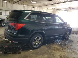 2017 Honda Pilot EX-L with VIN 5FNYF6H51HB027919, listed as a Copart auction lot 50951155 with 118,389 mi miles and Clean Title. Bid and sale history available at DreamBid. Image 3.