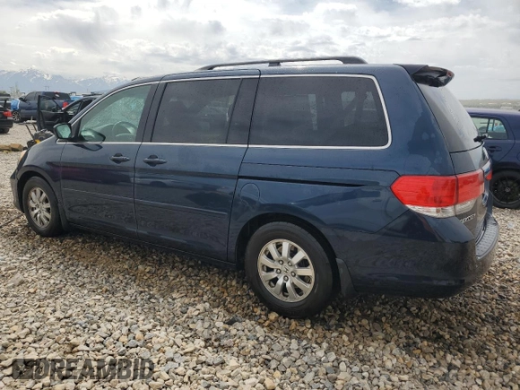 2009 Honda Odyssey EX-L with VIN 5FNRL38629B409446, listed as a Copart auction lot 54736045 with 176,229 mi miles and Salvage Title. Bid and sale history available at DreamBid. Image 2.