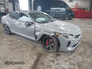 2020 Kia Stinger GT2 with VIN KNAE55LC3L6078474, listed as a IAAI auction lot 40901540 with 54,963 mi miles. Bid and sale history available at carsss.com. Image 1.