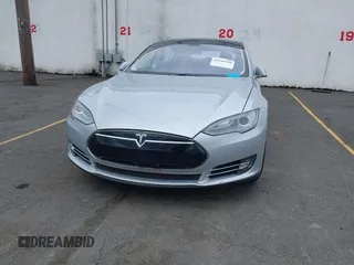 2014 Tesla Model S 60 with VIN 5YJSA1S13EFP53662, listed as a IAAI auction lot 42249930 with Not provided miles and . Bid and sale history available at DreamBid. Image 6.