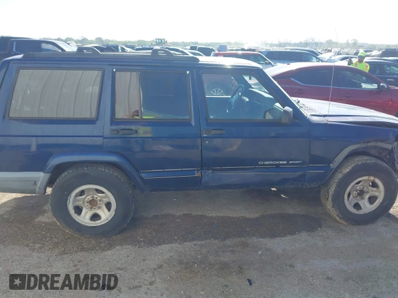 2001 Jeep Cherokee Sport with VIN 1J4FT48S01L522281, listed as a IAAI auction lot 41999570 with 261,698 mi miles and . Bid and sale history available at DreamBid. Image 13.