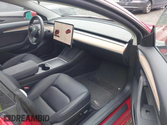 2023 Tesla Model 3 с VIN 5YJ3E1EA6PF601480, выставлен на аукционе IAAI как лот 42291689 с пробегом 21 565 миль миль и . История ставок и продаж доступна на DreamBid. Изображение 5.