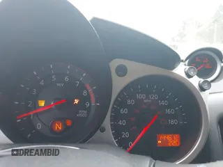 2009 Nissan 370Z Touring with VIN JN1AZ44E69M404341, listed as a IAAI auction lot 41907551 with 144,612 mi miles and . Bid and sale history available at DreamBid. Image 7.