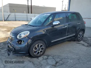 2014 FIAT 500L Lounge with VIN ZFBCFACH7EZ009822, listed as a Copart auction lot 78834114 with 73,274 mi miles and Salvage Title. Bid and sale history available at carsss.com. Image 1.