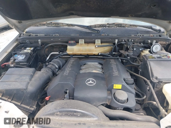 1998 Mercedes-Benz M-Class with VIN 4JGAB54E3WA031579, listed as a IAAI auction lot 42004335 with 156,898 mi miles. Bid and sale history available at carsss.com. Image 10.