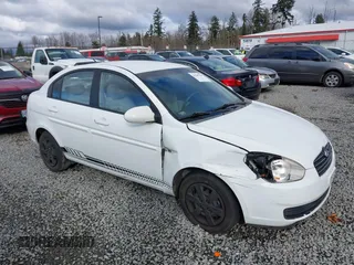 2006 Hyundai Accent GLS with VIN KMHCN46C36U009036, listed as a IAAI auction lot 41705369 with 134,328 mi miles. Bid and sale history available at carsss.com. Image 13.