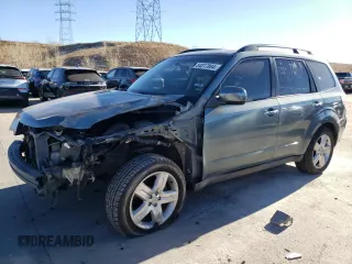 2009 Subaru Forester X with VIN JF2SH63619H712506, listed as a Copart auction lot 84017804 with 156,615 mi miles and Salvage title. Bid and sale history available at DreamBid. Image 1.